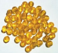50 8mm Round Transparent Dark Yellow Glass Beads